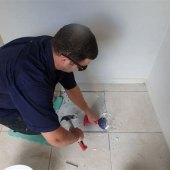 How To Fix Loose Floor Tiles In Bathroom