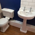 How To Conceal Pipes In Bathroom