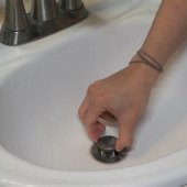 How Do You Remove The Drain Stopper From A Bathroom Sink